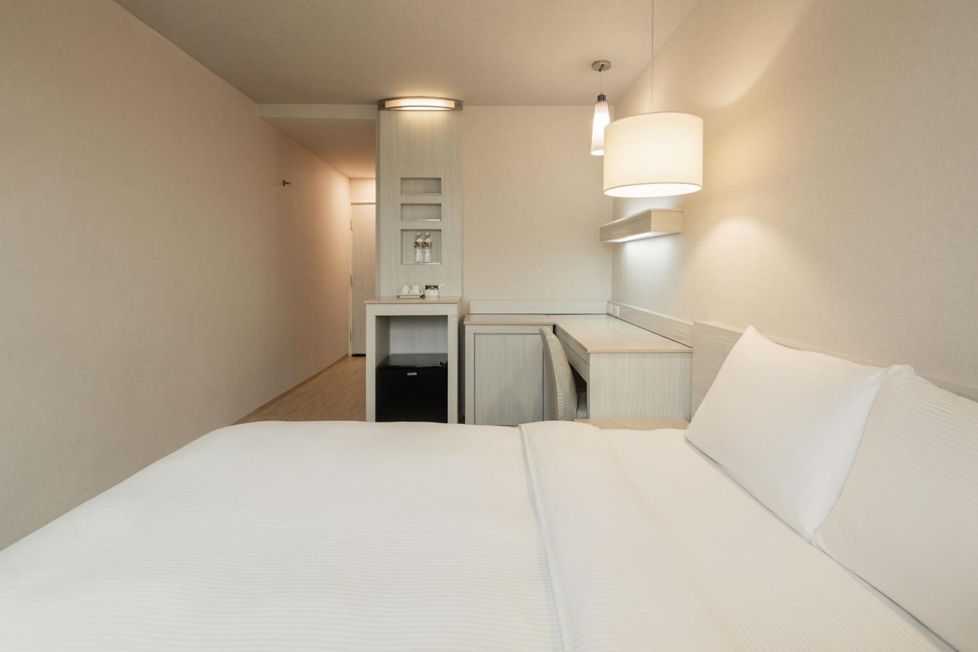 Kindness Hotel - Houyi Jiuru Гаосюн Номер фото