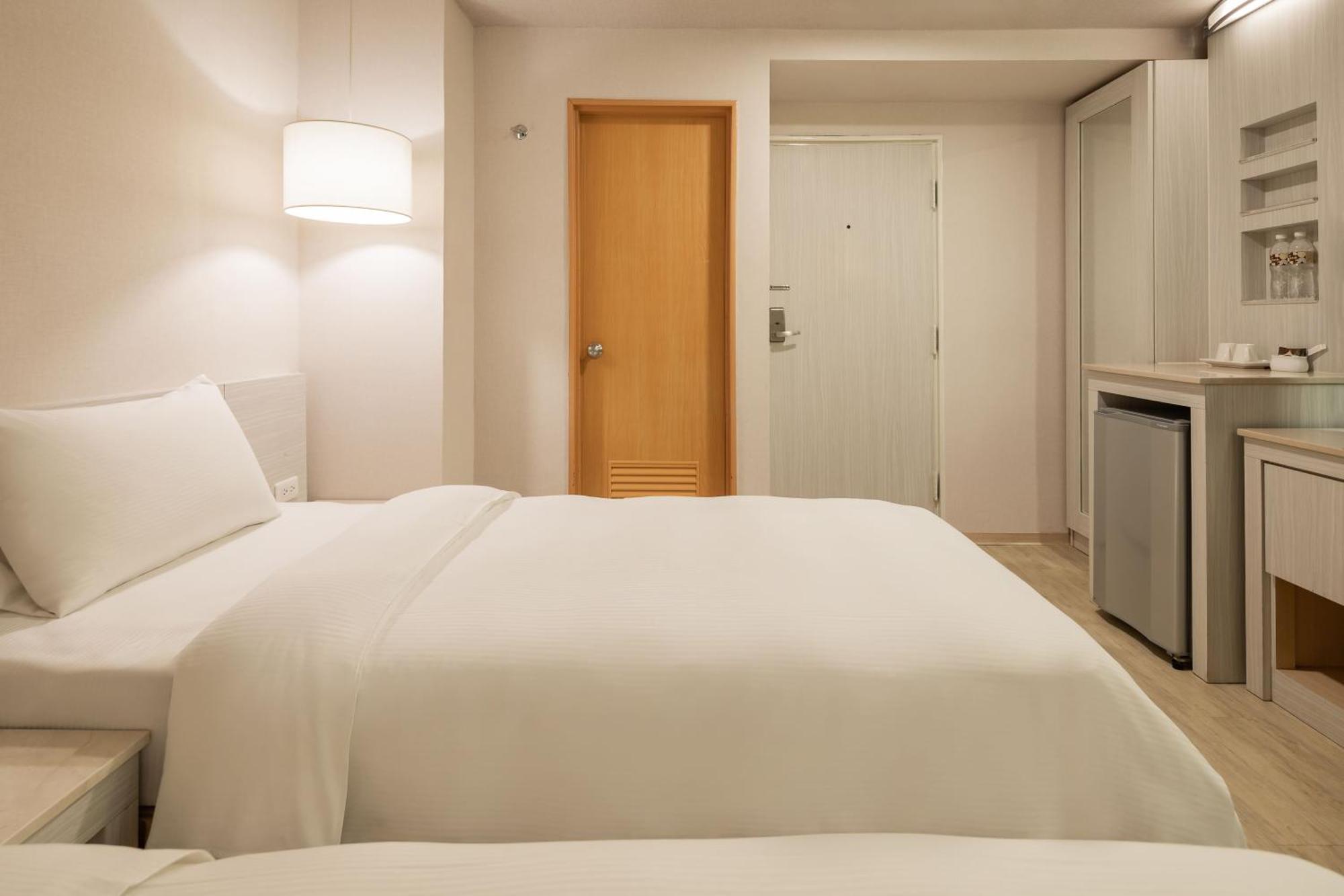 Kindness Hotel - Houyi Jiuru Гаосюн Номер фото
